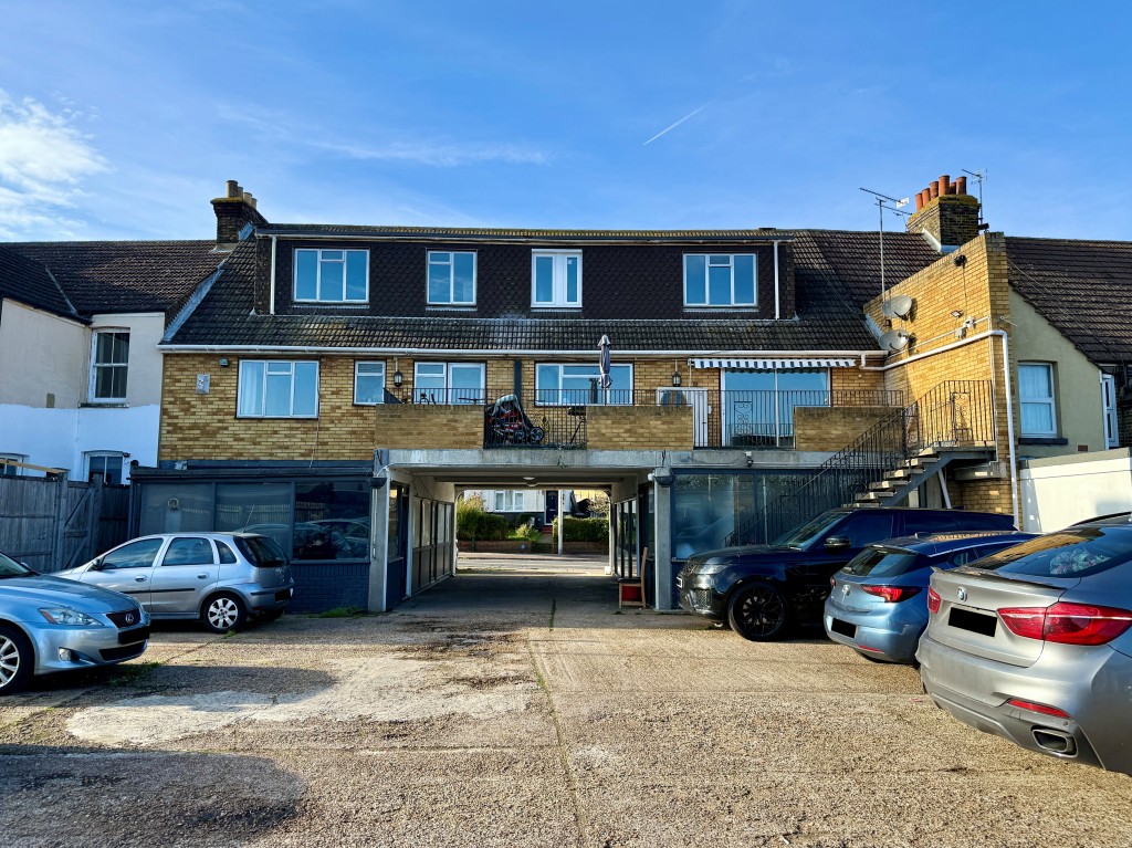 Lot: 14 - MIXED USE INVESTMENT WITH VACANT PARTS - Rear view of building